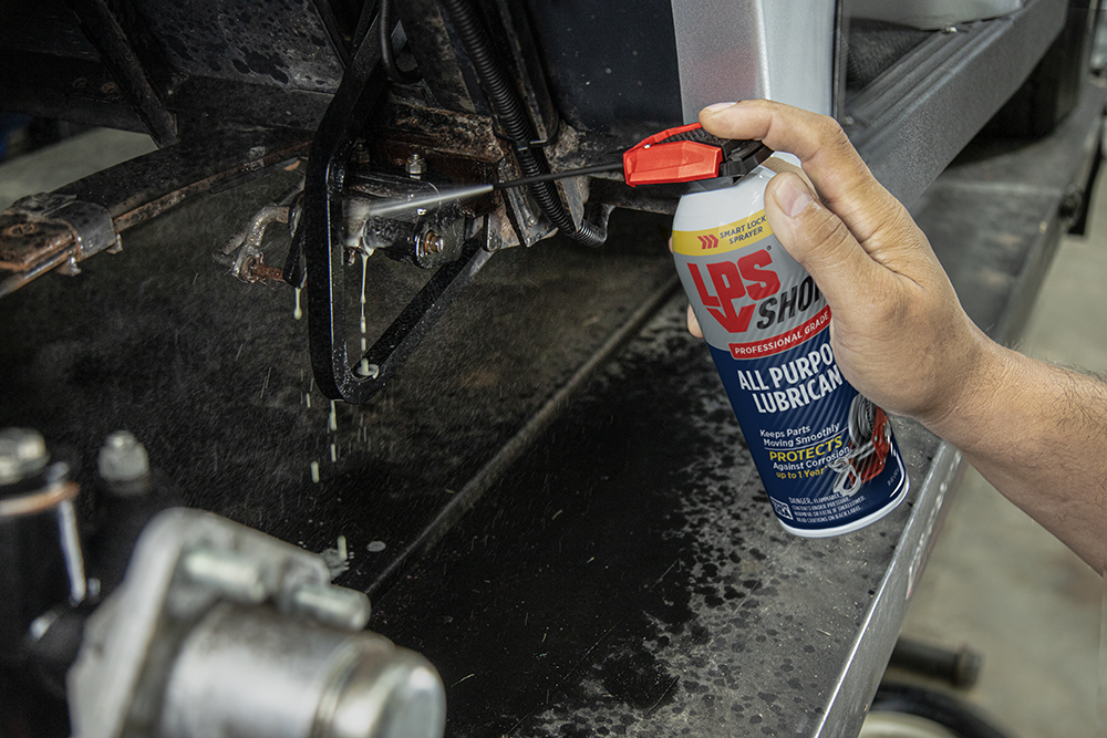 LPS Shop All Purpose Lubricant spraying nuts and bolts.